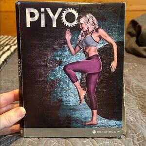 Beachbody PiYo Fitness DVD with Purple and Gray Accents